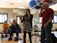 Wounded Warriors at the neurologic music therapy group at Naval Medical Center San Diego learn the harmonica Feb. 28. Music therapy helps improve motor skills, memory retention and relieves stress.